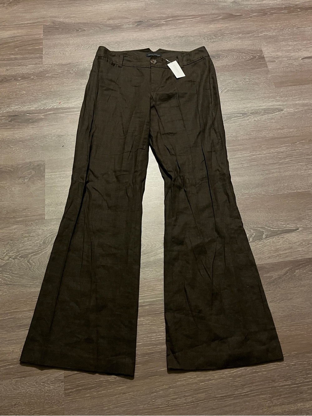 Banana Republic dark brown flared pants with subtle vertical pinstripes, size 8.